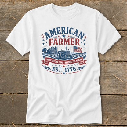 White t-shirt with "American Farmer" graphic, tractor, barn, and American flag.
