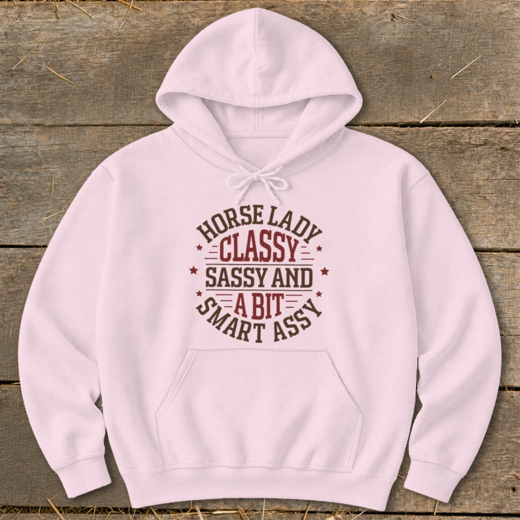 Light pink hoodie with text: "Horse lady, classy, sassy and a bit smart assy".