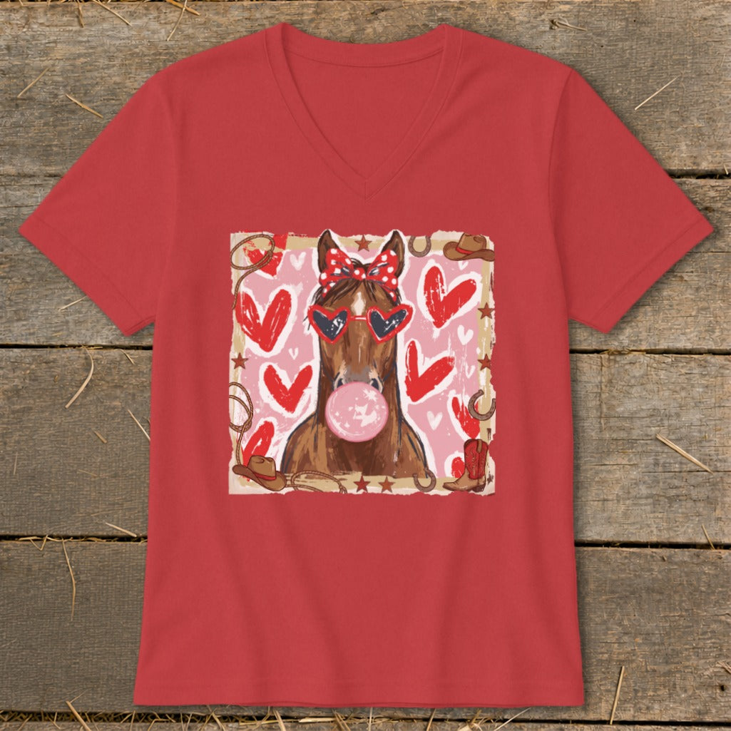 Horse with heart sunglasses and bow blowing bubblegum on red t-shirt.
