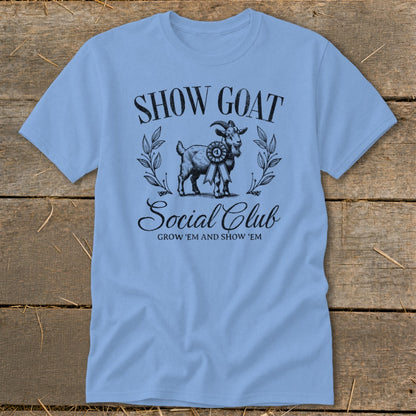 Light blue t-shirt with "Show Goat Social Club" and a goat graphic.