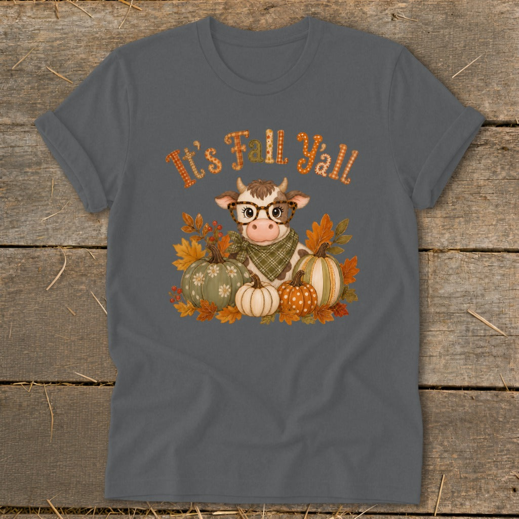 Cow wearing glasses surrounded by pumpkins and fall leaves, with "It's Fall Y'all" text.