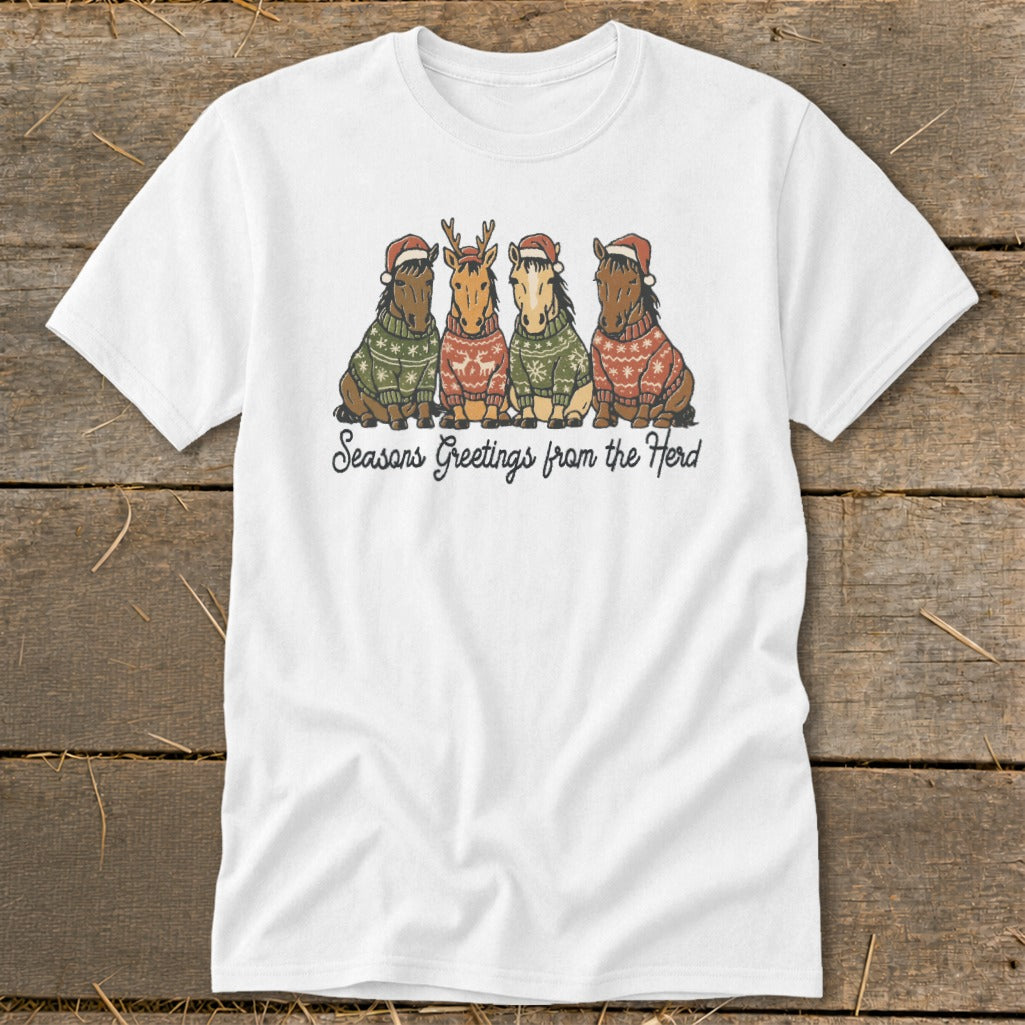 Four horses wearing Christmas sweaters and Santa hats, with text "Seasons Greetings from the Herd".