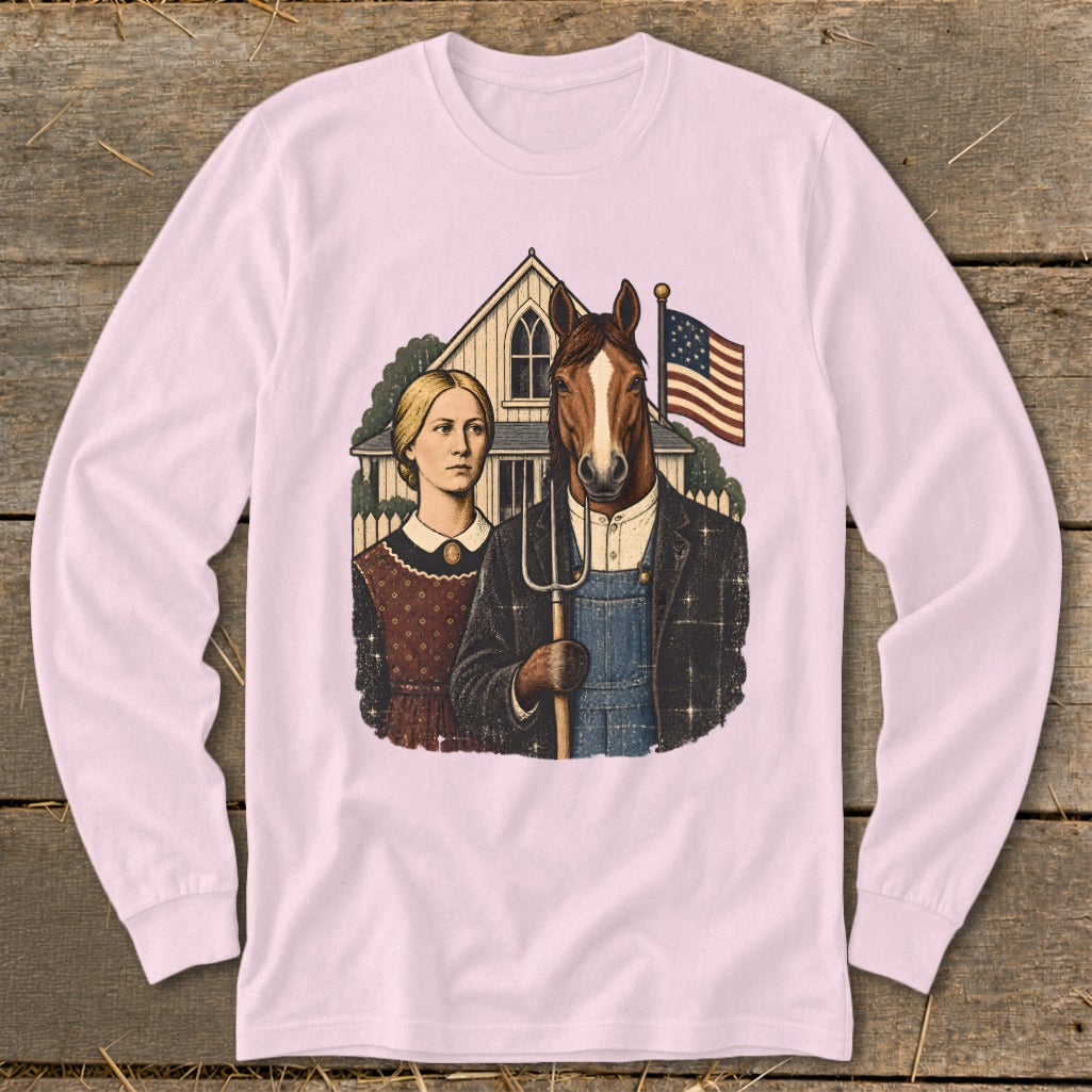 Light pink long-sleeve shirt featuring a parody American Gothic graphic with a woman and a horse holding a pitchfork.