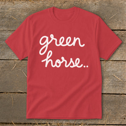 Red t-shirt with white cursive text "green horse..".