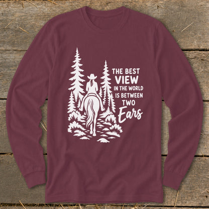 Maroon long-sleeve t-shirt with a white graphic of a horseback rider and pine trees.