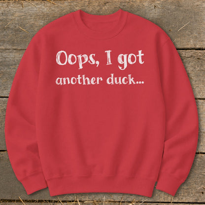 Red sweatshirt with white text reading "Oops, I got another duck..."