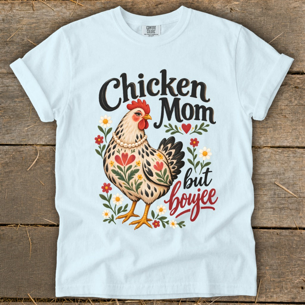 Light blue t-shirt with chicken artwork and "Chicken Mom but boujee" text.