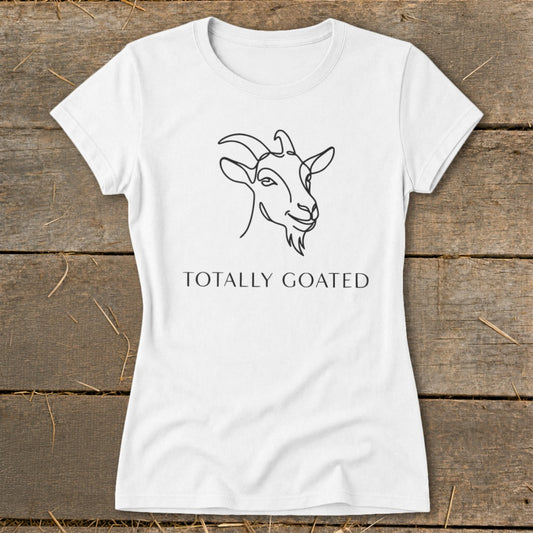 White t-shirt with line drawing of a goat and text "TOTALLY GOATED".