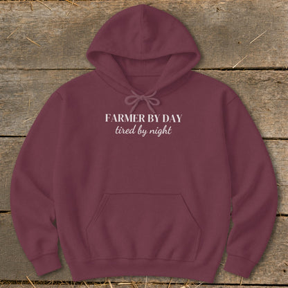 Maroon hoodie with "FARMER BY DAY tired by night" text on chest.
