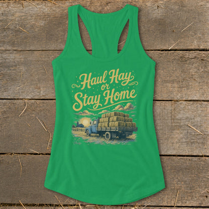 Green tank top with "Haul Hay or Stay Home" text over a truck loaded with hay bales.