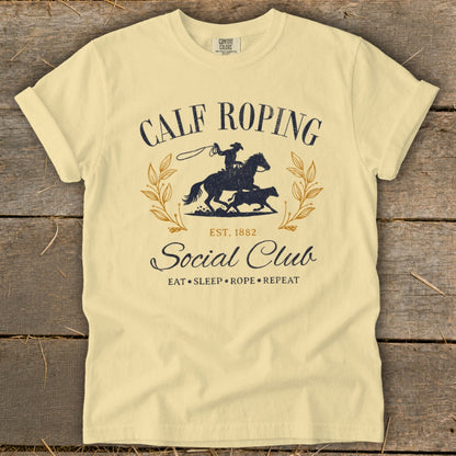 Calf Roping Social Club t-shirt with horse, rider, calf, and text.