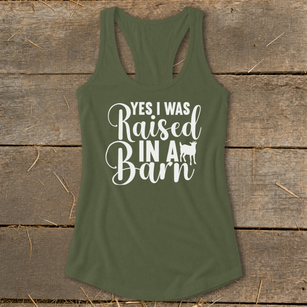 Green tank top with "Yes I Was Raised In A Barn" text and a goat silhouette.