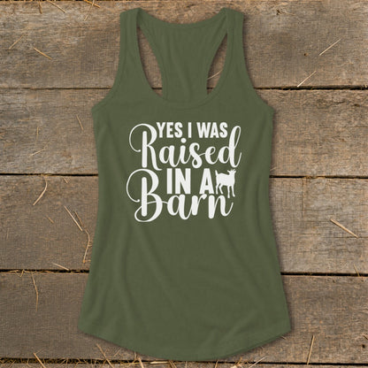 Green tank top with "Yes I Was Raised In A Barn" text and a goat silhouette.