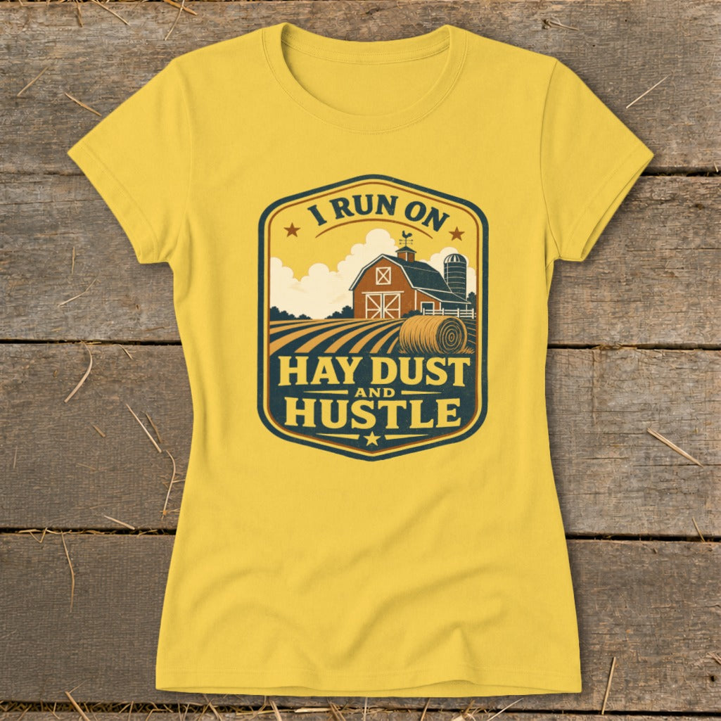 Yellow t-shirt with "I run on hay dust and hustle" farm graphic.