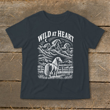 Dark t-shirt with "WILD AT HEART" text and line art of horses and a pony.