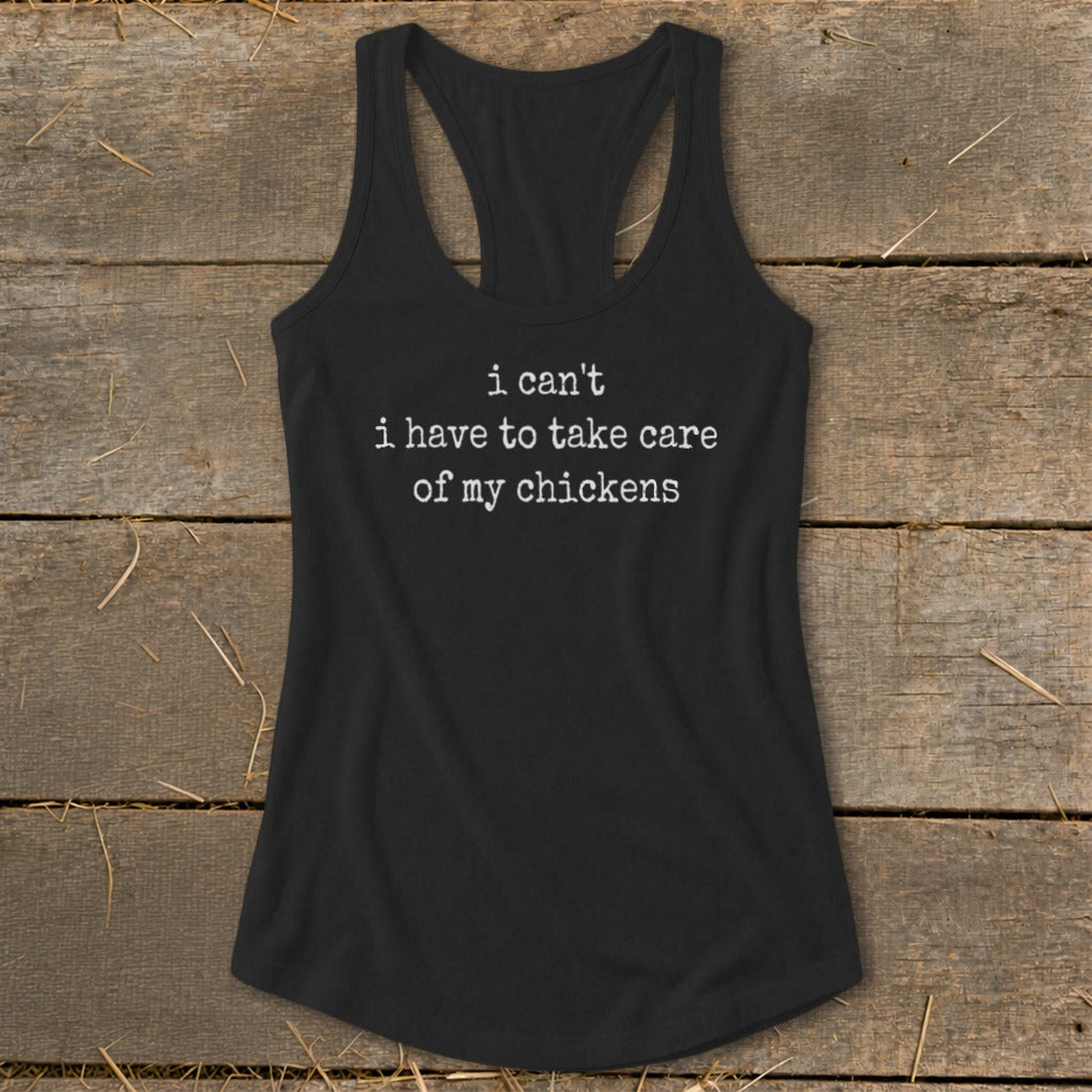 Black tank top with white text that reads "i can't i have to take care of my chickens".