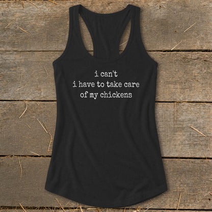 Black tank top with white text that reads "i can't i have to take care of my chickens".