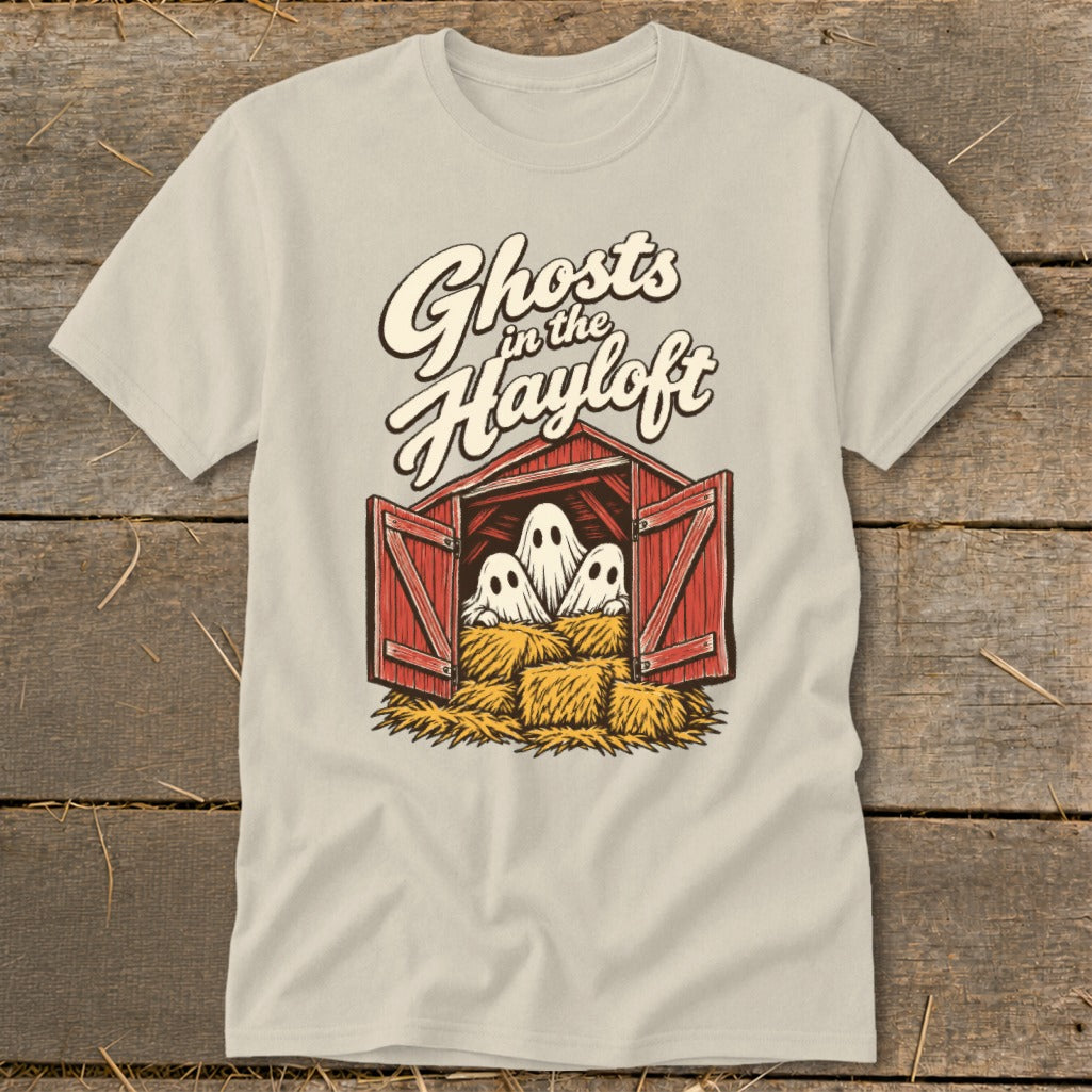 Ghosts in the Hayloft graphic on a light-colored t-shirt with ghosts in a barn.