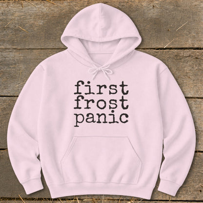 Pink hoodie with "first frost panic" text in black typewriter font.