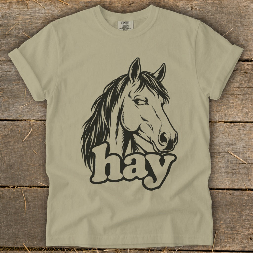 T-shirt with black horse head graphic and the word "hay" in text.