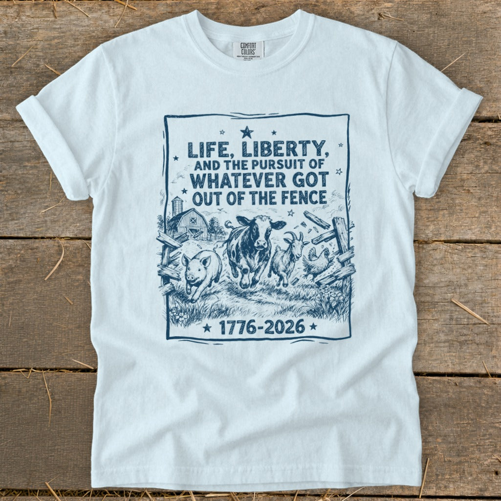 T-shirt with graphic of farm animals escaping a fence and text "1776-2026".