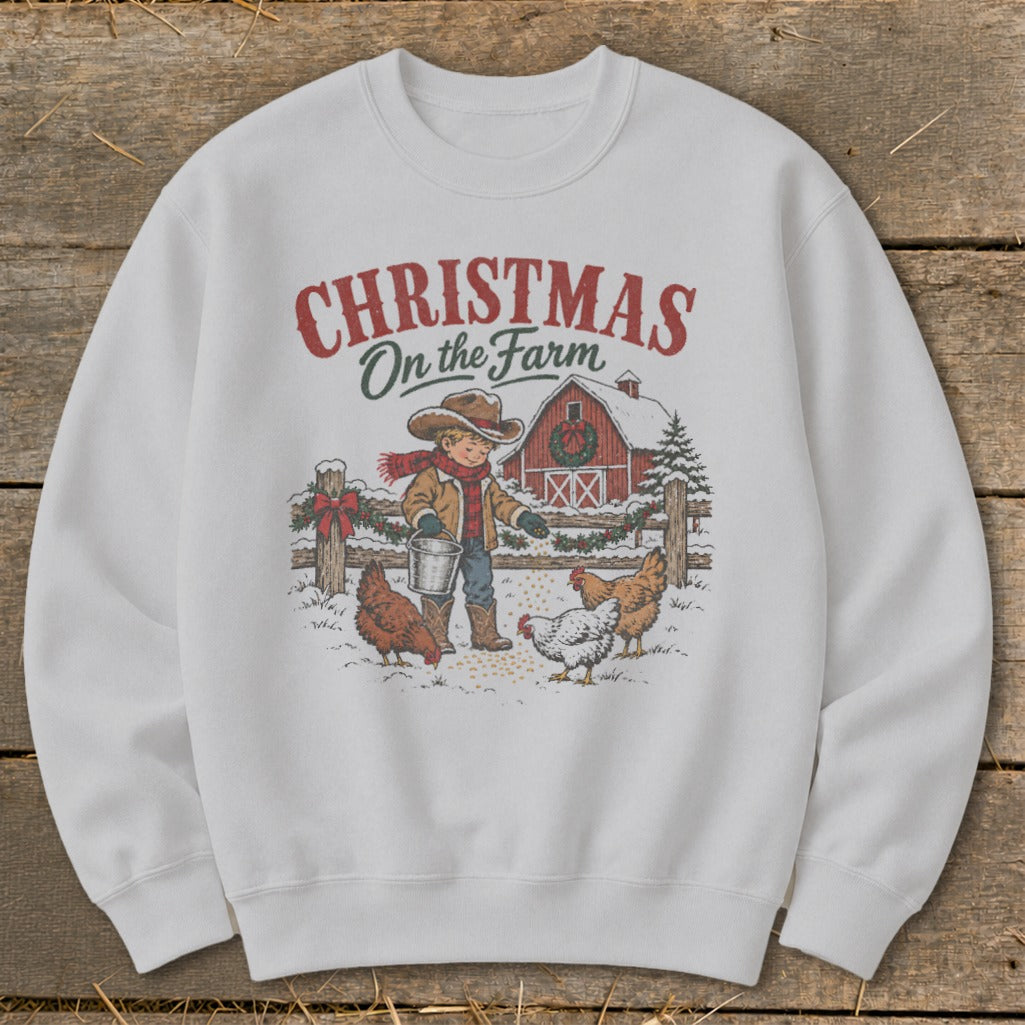 Christmas on the Farm illustration with boy feeding chickens and a red barn.