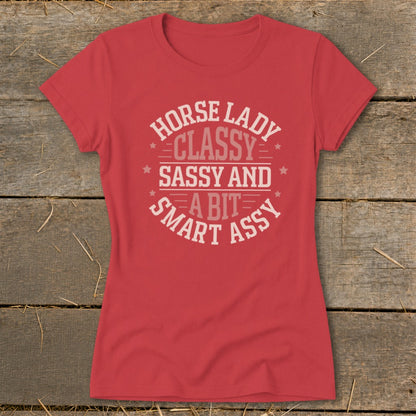 Red t-shirt with "Horse Lady Classy Sassy and a Bit Smart Assy" text.