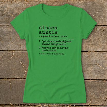 Green t-shirt with "alpaca auntie" definition: "Spits back, brings treats. Knows vibe and volume."