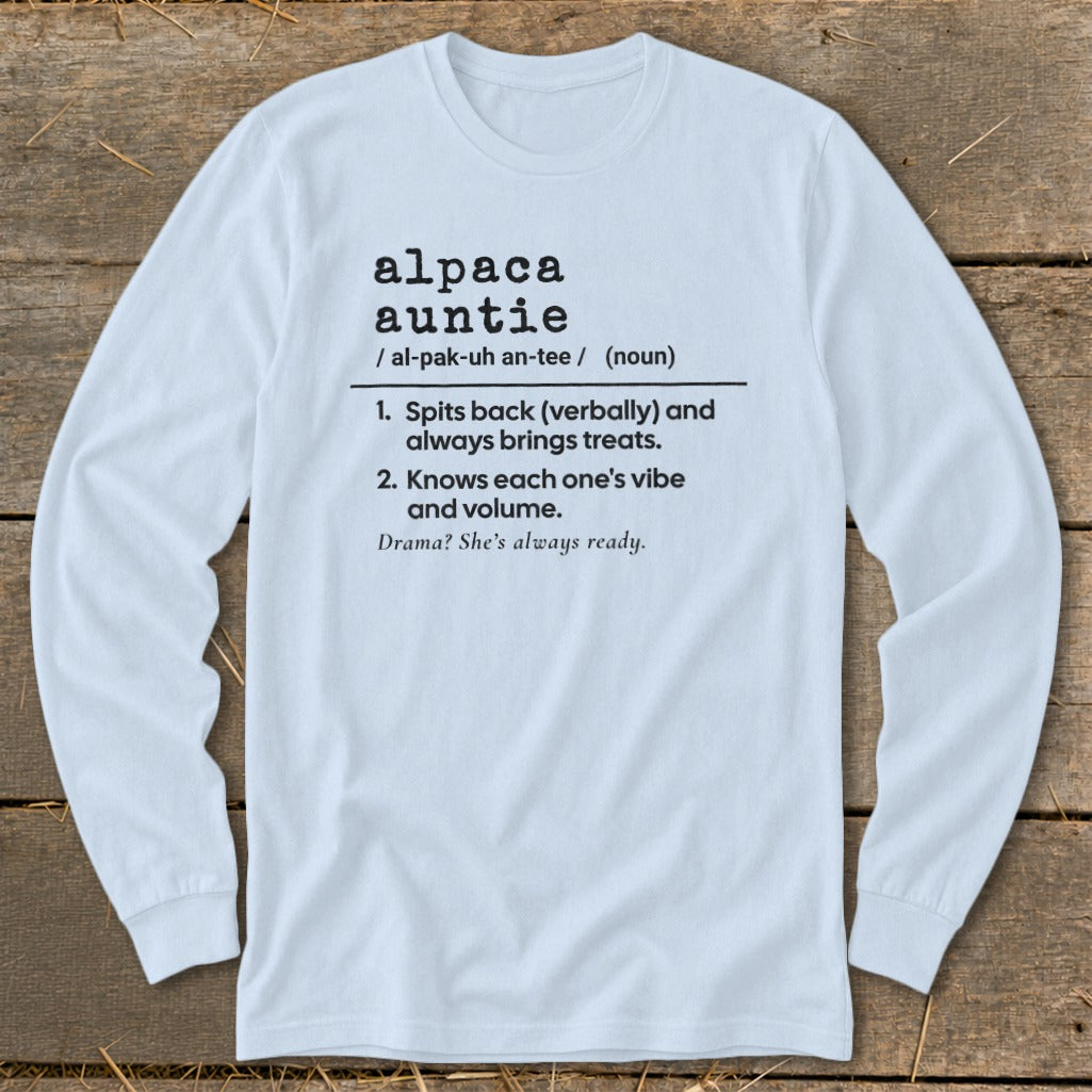 Light blue long sleeve shirt with black text defining "alpaca auntie" and its traits.