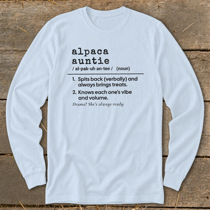 Light blue long sleeve shirt with black text defining "alpaca auntie" and its traits.