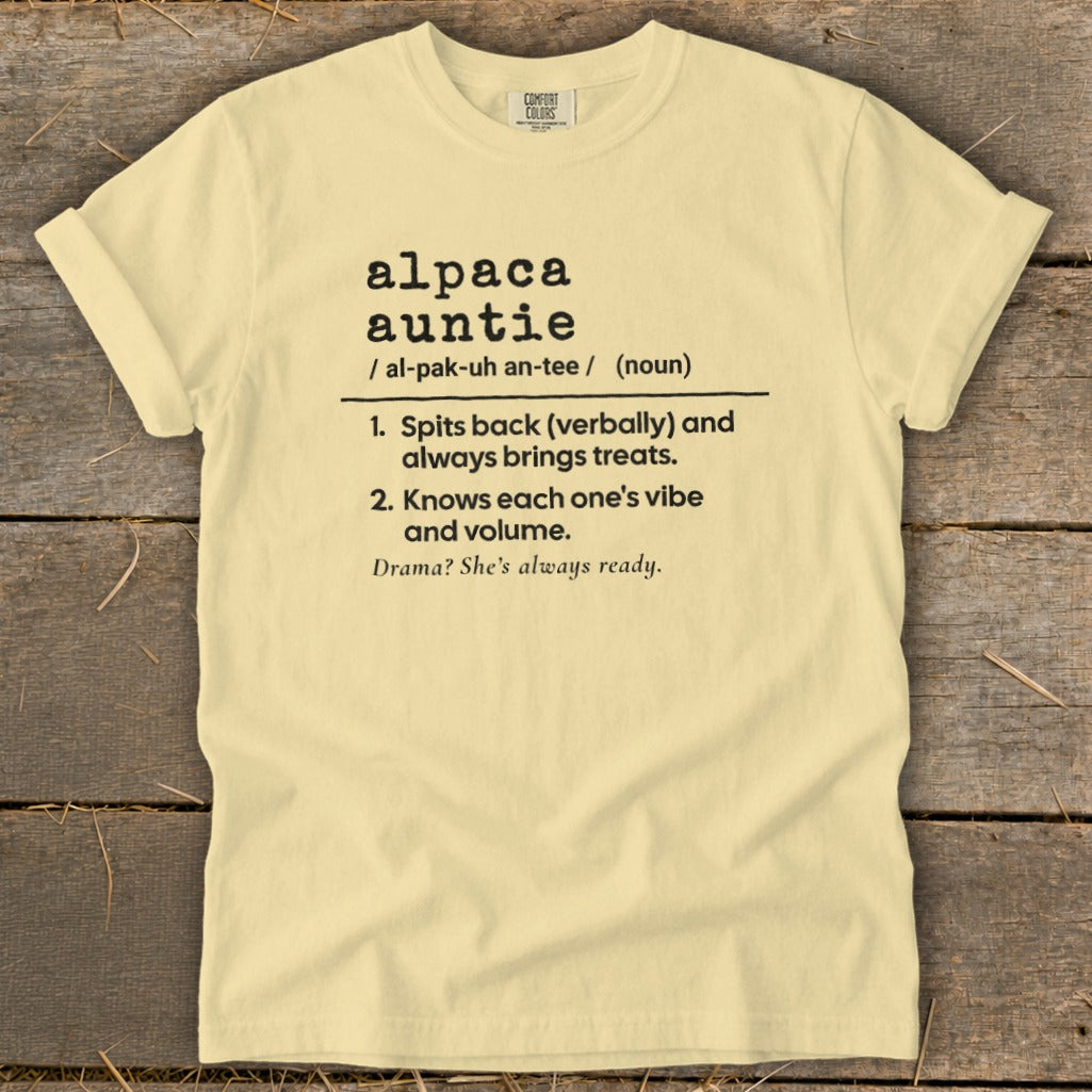 Yellow t-shirt with "alpaca auntie" definition and humorous descriptions.