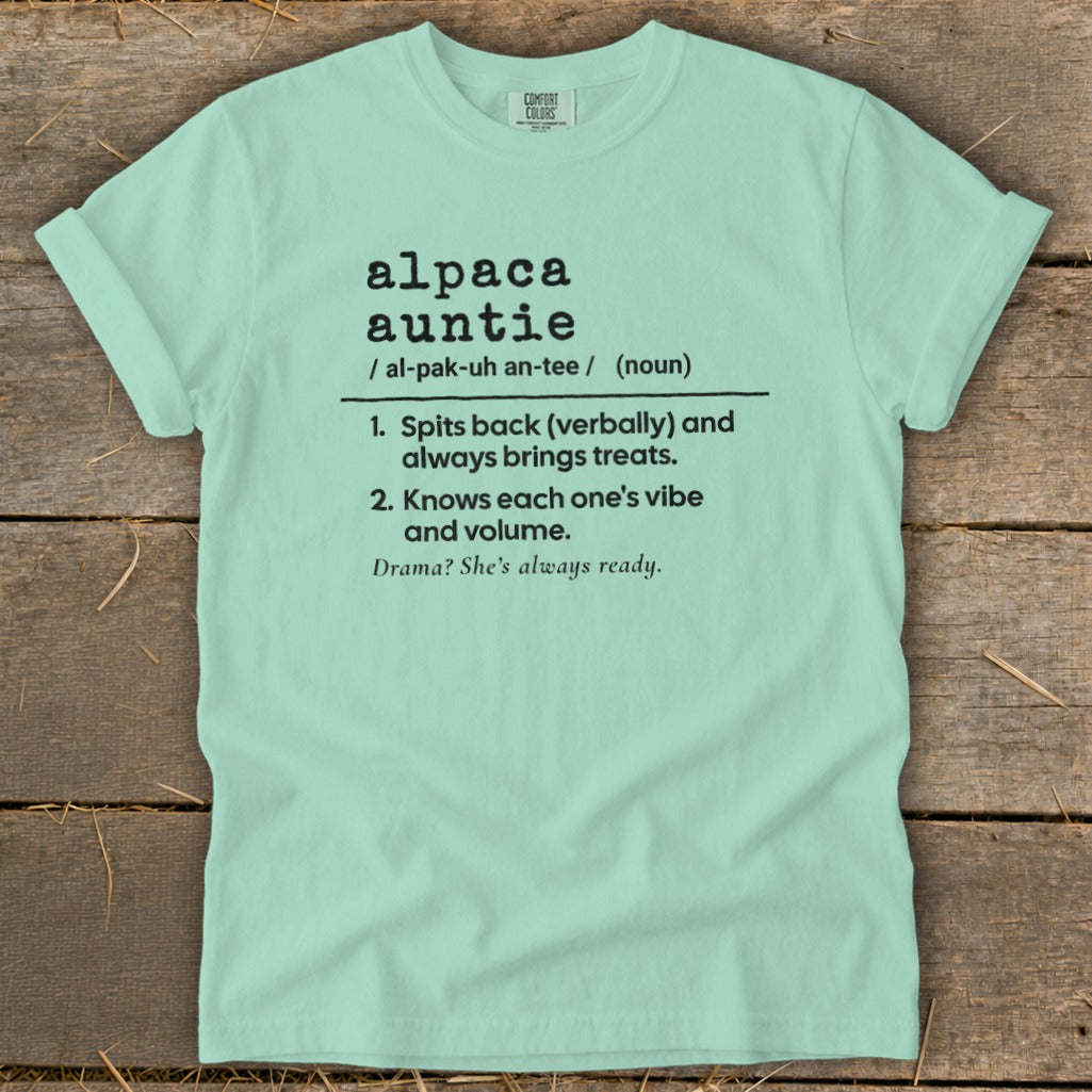 Mint t-shirt with "Alpaca Auntie" definition printed in black text.