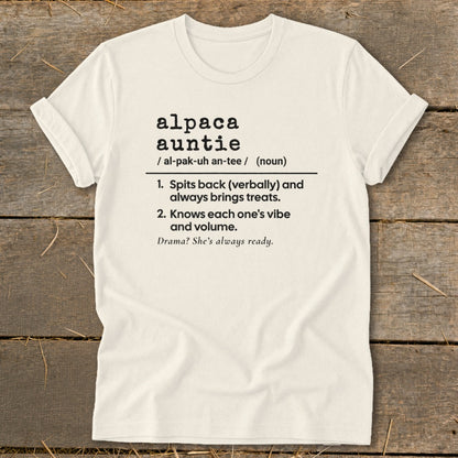 Cream t-shirt with black text defining "alpaca auntie".