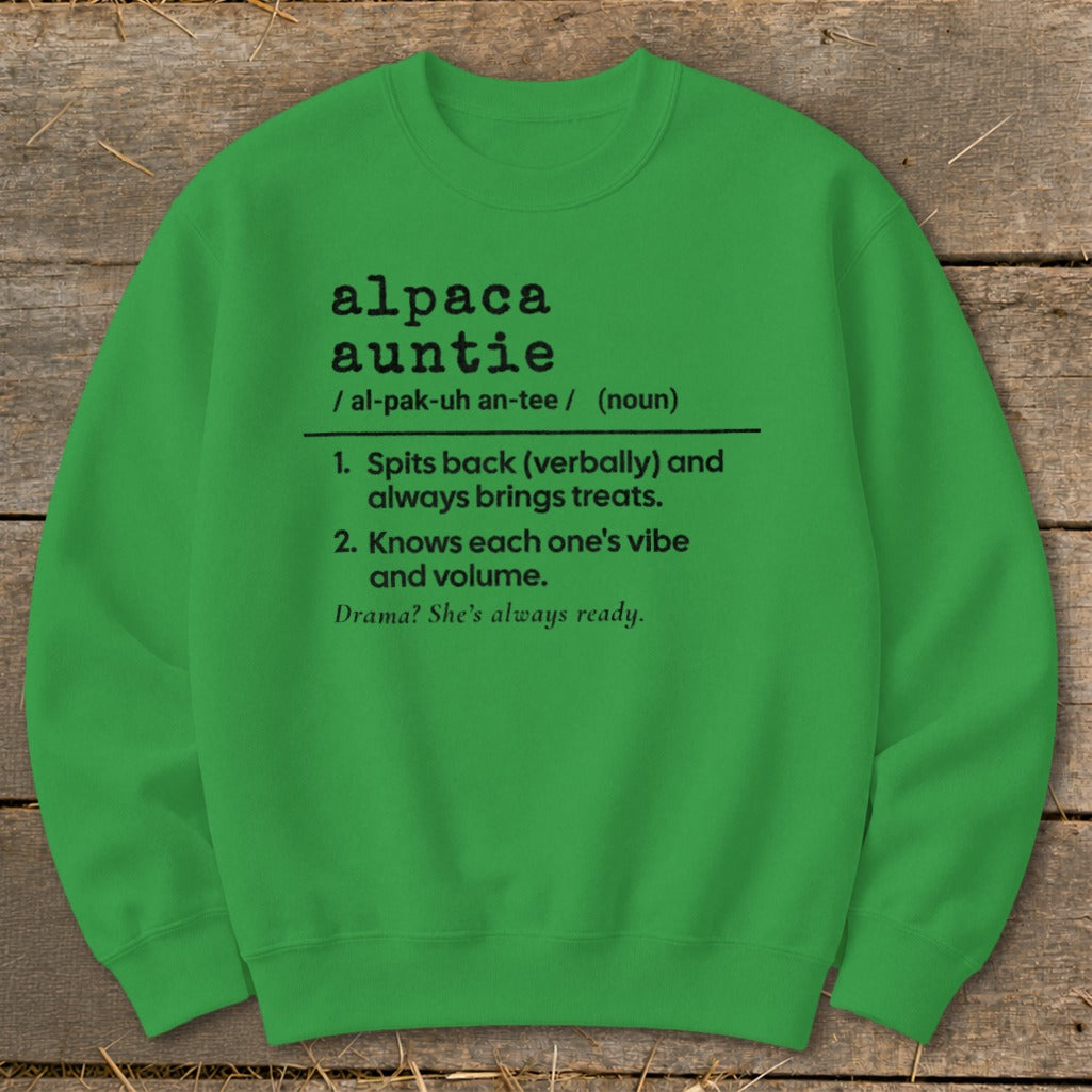 Green sweatshirt with "alpaca auntie" definition including pronunciation and two descriptive phrases.