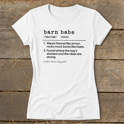 White t-shirt with "barn babe" definition: "Wears flannel, rocks muck boots. Found where hay's stacked."