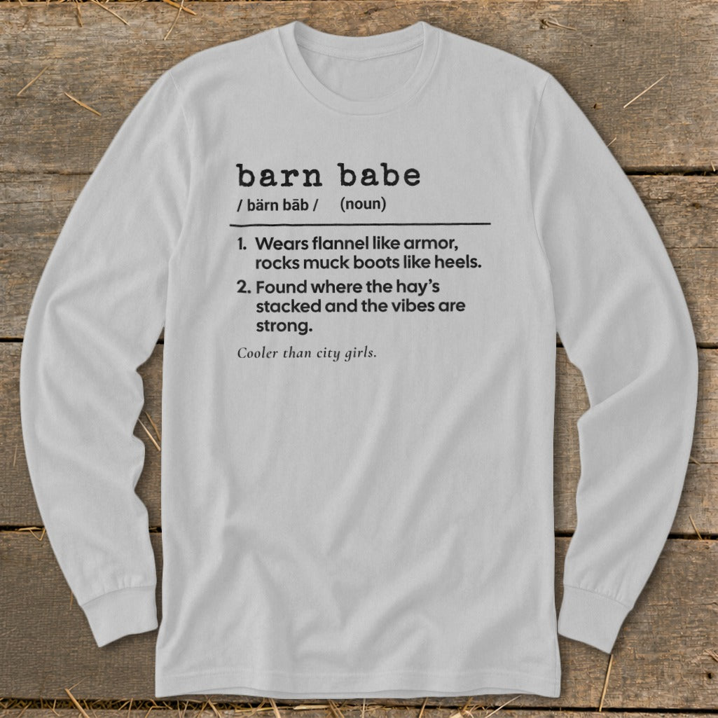 Long sleeve shirt with "barn babe" definition and description in black text.