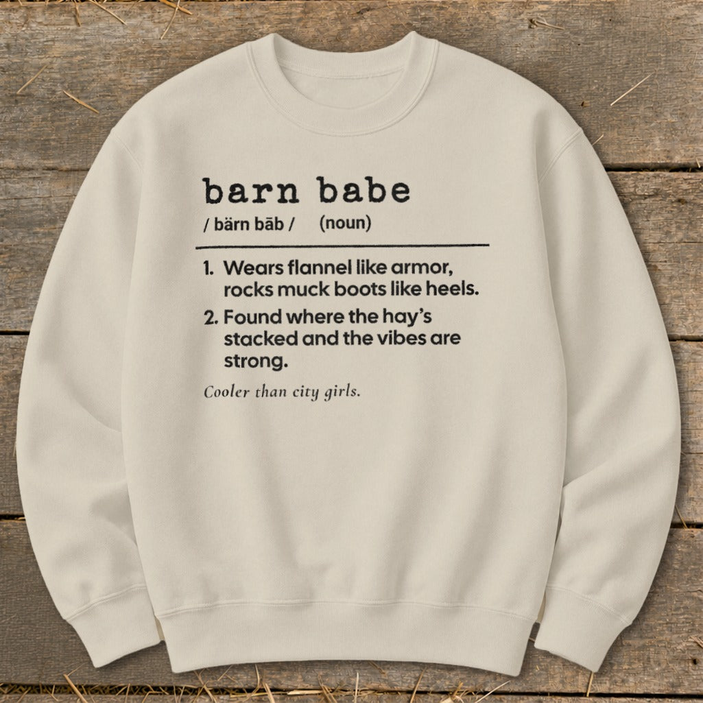 Cream sweatshirt with "barn babe" definition: wears flannel, muck boots, and likes hay.