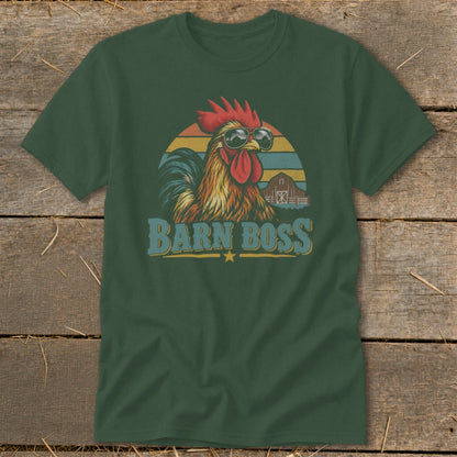 A dark green t-shirt with a vintage graphic of a rooster wearing sunglasses in front of a barn and sunset, with the text BARN BOSS.