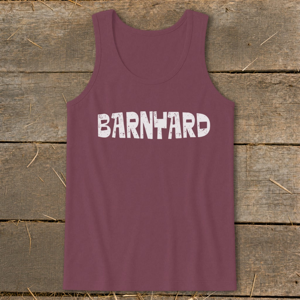 Maroon tank top featuring distressed white text that reads BARNYARD centered on a wooden surface.