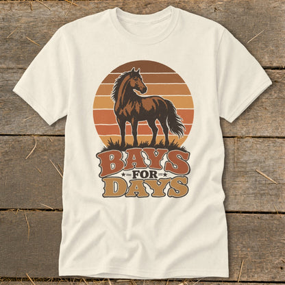Off-white t-shirt featuring a retro graphic of a brown horse standing in front of a striped sunset and the text Bays for Days.