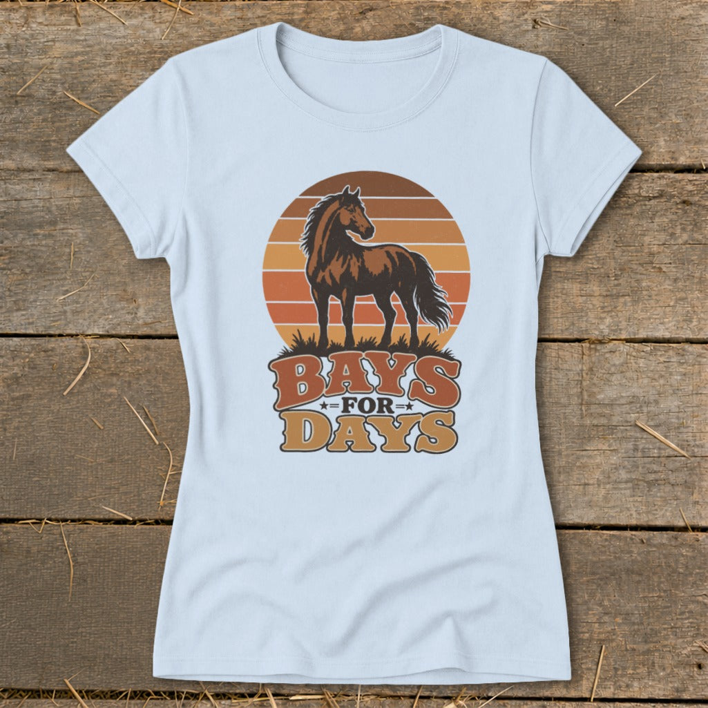 A light blue short-sleeved t-shirt featuring a retro graphic of a brown horse against a striped sun.