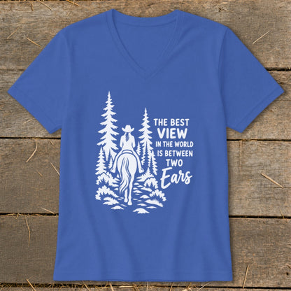 Blue V-neck t-shirt featuring a white graphic of a horseback rider in the woods and the text The Best View in the World is Between Two Ears.