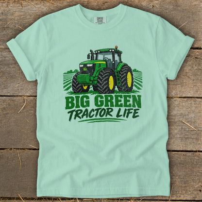 Green tractor graphic with "BIG GREEN TRACTOR LIFE" text on a light green t-shirt.