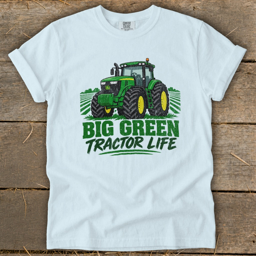White t-shirt with green tractor graphic and text "BIG GREEN TRACTOR LIFE".