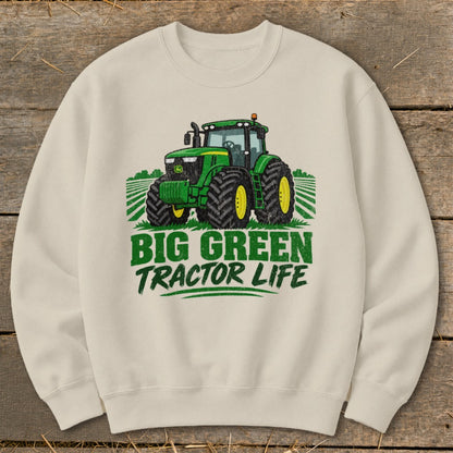 Light cream sweatshirt with a green tractor graphic and "Big Green Tractor Life" text.