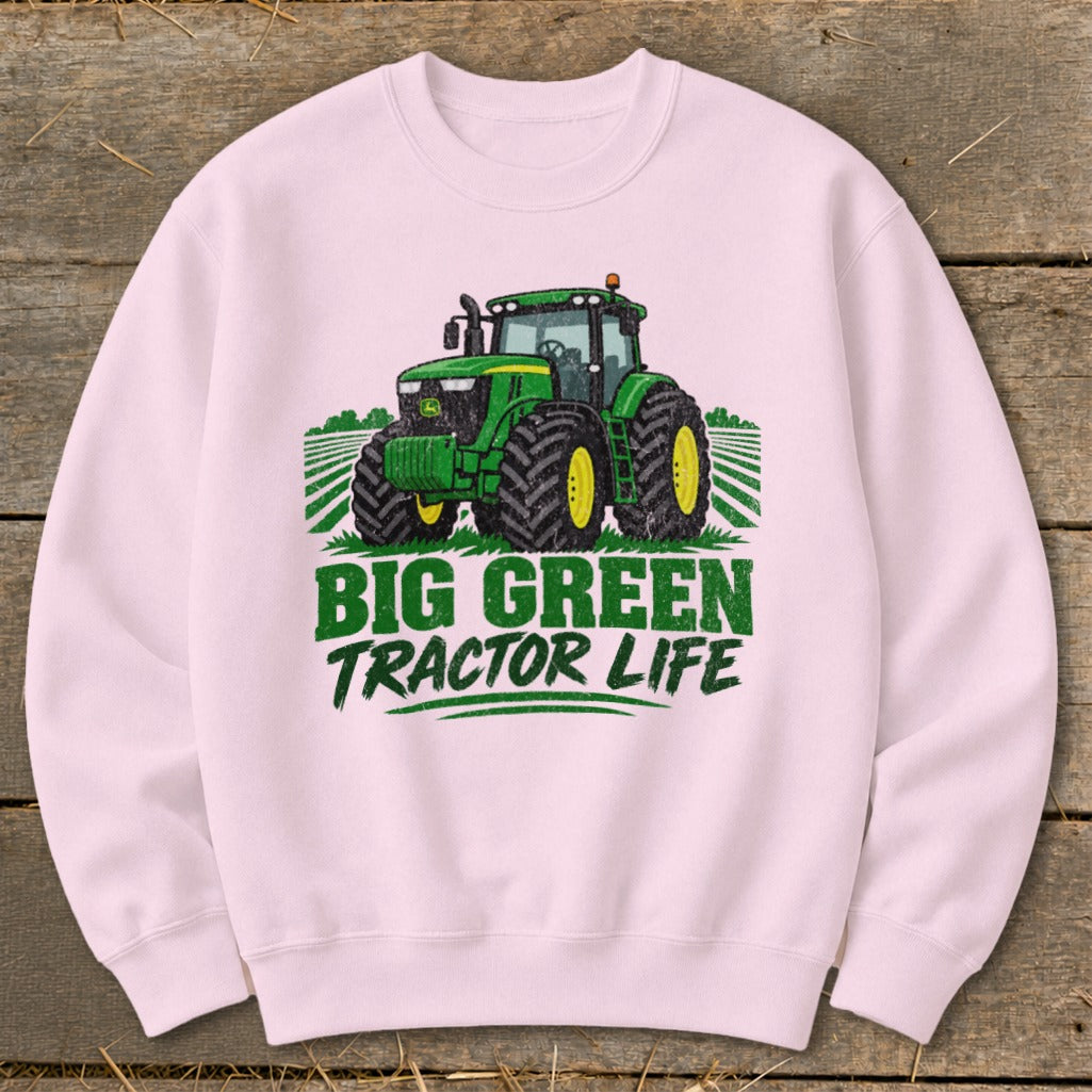 Pink sweatshirt with green tractor graphic and "Big Green Tractor Life" text.