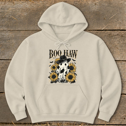 Cream hoodie with a ghost wearing a cowboy hat, sunflowers, and bats; text reads "BOO HAW".