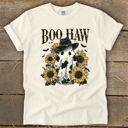 White t-shirt with "Boo Haw" text, a cow-patterned ghost wearing a cowboy hat, and sunflowers.