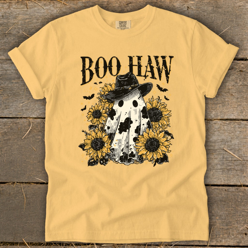 Yellow t-shirt with "Boo Haw" text, a cow-patterned ghost, and sunflowers.