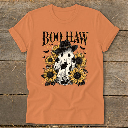 Ghost with cow print, hat, sunflowers, and text "BOO HAW".
